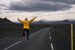 © Westend61 - Happy man jumping for joy on an empty road, Iceland