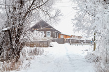 Russian Village In Winter Covered Snow