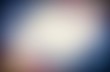 © avextra - Muted blue yellow red soft vignette patern. Vintage dark smoky blur background.