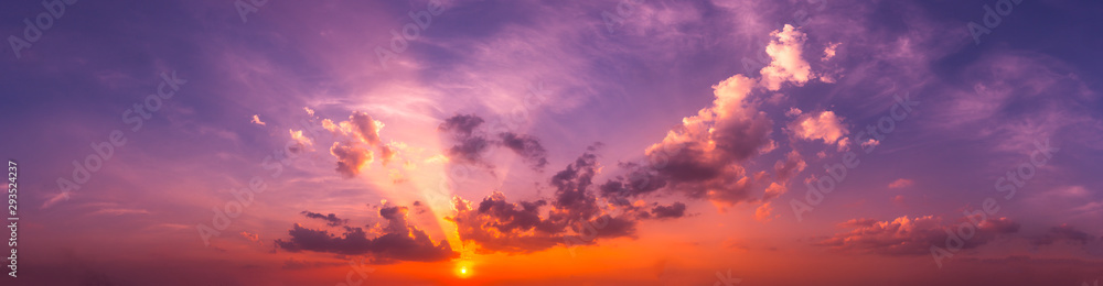 Panorama Sunlight with dramatic sky. Cumulus sunset clouds with sun setting down on dark background.Vivid orange cloud sky. - obrazy, fototapety, plakaty 