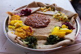 Fototapeta  - Injera firfir, typical Ethiopian food