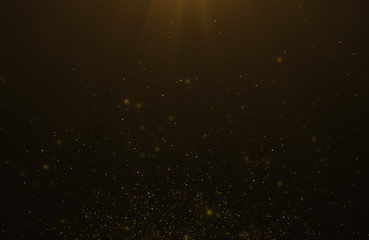 Wall Mural - abstract background of flickering gold particles and light flare