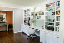 Colorful Living Room Home Office Area Modern And Clean And Well Organized With Desks And Chairs And A Display Bookcase
