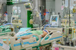 Patient with  life saving equipment for treatment in ICU at the hospital.
