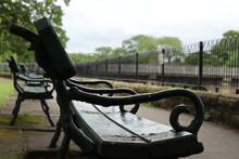 A Wet Bench Beside A River In Otley, Yorkshire 