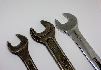 Three old working wrenches on a white background. Work Tool mechanic. Close up