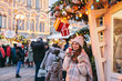 © Alena Ozerova - Girl walking on Christmas Market on Red Square in Moscow