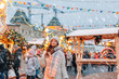 © Alena Ozerova - Girl walking on Christmas Market on Red Square in Moscow