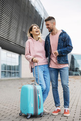 Couple In Love Meeting At Airport, Hugging And Kissing