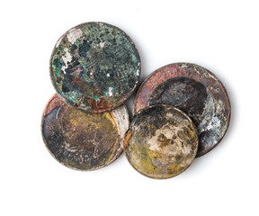 Wall Mural - Old rusted coins,Oxidized old coins on white background.