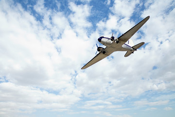 Airplane in the sky. Copy space of business summer vacation and travel adventure concept. Airplane sky and sunshine 