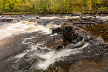 Wall Mural - Eau Claire River Waterfall In Autumn