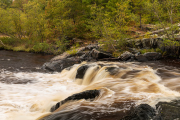 Wall Mural - Eau Claire River Waterfall In Autumn