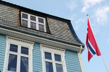 Fototapeta  - House in Norway with Norwegian flag