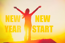 New Year New Start Success Winner Concept Happy Woman Motivation Inspirational Quote On Silhouette Person In Sunset With Arms Up In Confidence. You Can Start To Change Your Life.