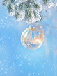 winter festive composition. Christmas and new year concept. winter holiday background. beautiful Composition with glass ball on snow fir branch. copy space. soft selective focus