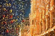 Winter Holiday Blurred Background. Festive Illuminations On City Street. Abstract Defocused Festive Backdrop. Winter Street. Soft Selective Focus