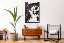 Stylish Interior Design Of Living Room With Wooden Retro Commode, Chair, Tropical Plant In Rattan Pot, Basket And Elegant Personal Accessories. Mock Up Poster Frame On The Wall. Template. Home Decor.