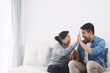 © Mallika - man and woman talking on cell phone