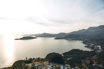 Wall Mural - Beautiful view of the natural landscape in Montenegro. Coastline, sea and mountains at sunset.