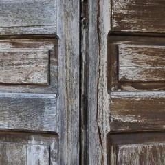 Close up of two old wooden doors