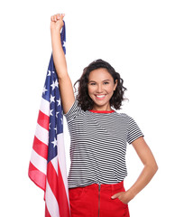 Wall Mural - Happy young woman with American flag on white background