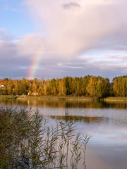 Wall Mural - wonderful autumn landscape with gorgeous and colorful trees by the water, beautiful reflections in the water