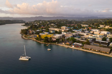 Port Villa Waterfront And Business District With Catamaran In Vanuatu Capital City In The South Pacific