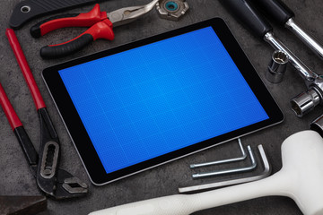 Household tools and tablet with grid screen concept