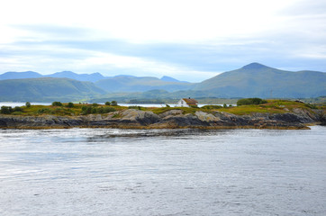 Wall Mural - Rocky Fjord Landscape and an Isolated House in Norway