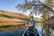 © MarekPhotoDesign.com - paddling expedition canoe on lake POV