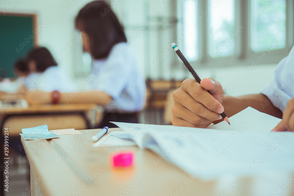 Group student testing in exercise taking fill in exam paper answer ...