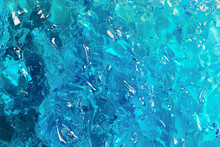 Blue Cosmetic Gel Texture. Bright Color Jelly Closeup Background