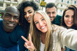 © javiindy - Multiracial group of young people taking selfie