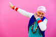 Leinwandbild Motiv Funny grandmother portraits. 80s style outfit. Dab dance on colored backgrounds. Concept about seniority and old people