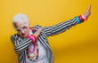 Leinwandbild Motiv Funny grandmother portraits. Senior old woman dressing elegant for a special event. granny fashion model on colored backgrounds