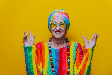 Wall Mural - Funny grandmother portraits.granny fashion model on colored backgrounds