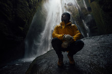 Man Exploring Iceland. Wanderlust Explorer Discovering Icelandic Natural Wonders