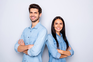 Poster - Close-up portrait of his he her she nice attractive cheerful cheery content couple partners leaders wearing casual folded arms standing back to back isolated over light white pastel color background