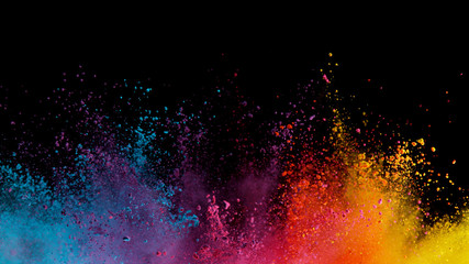 Wall Mural - Explosion of colored powder on black background