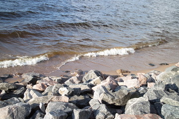 Waves near the shore close up on a sunny day