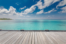 Beautiful Beach With Water Bungalows And Old Wooden Pier At Maldives