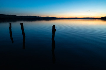 old pier in sunset on lake in sempach switzerland colourful sky