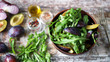 © Oksana - Light salad with arugula and plums. Autumn plum salad. Healthy food. Selective focus. Macro.