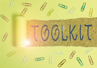 Writing note showing Toolkit. Business concept for set of tools kept in a bag or box and used for a particular purpose