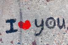 I Love You Lettering With A Bright Red Heart On A Gray Rough Concrete Surface