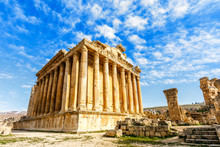 Ancient Roman Temple Of Bacchus With Surrounding Ruins With Blue Sky In The Background, Bekaa Valley, Baalbek, Lebanon