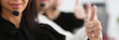 © H_Ko - Three call centre service operators arm show OK or confirm at work. High level and quality aid okay symbol effective mediation adviser negotiation participation solve problem real time concept