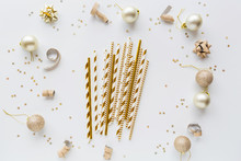 New Year Or Christmas Pattern Flat Lay Top View 2020 Xmas Holiday Celebration Drinking Cocktail Party Paper Straws Golden Color On White Background. Template, Mockup For Greeting Card Text Design