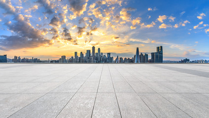 Empty square floor and modern city skyline in chongqing at sunset,China.